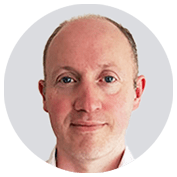 Headshot of Andrew McConaghie.