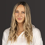 Headshot of Flora Mackay.