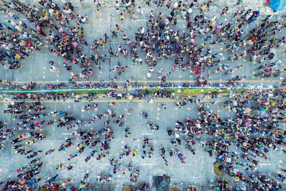 Aerial shot of a diverse group of people in the street.