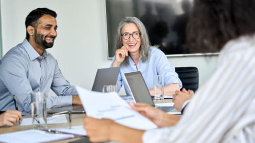 Professionals collaborating using Citeline's commercial solutions to determine potential market partners.