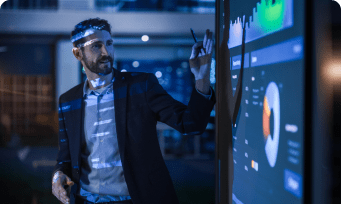 Person in front of a presentation board.