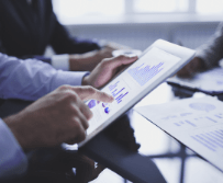 Citeline professionals monitoring disclosure regulations on a tablet device.